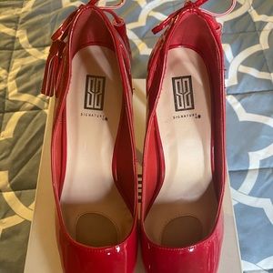 Red high heeled pump with box